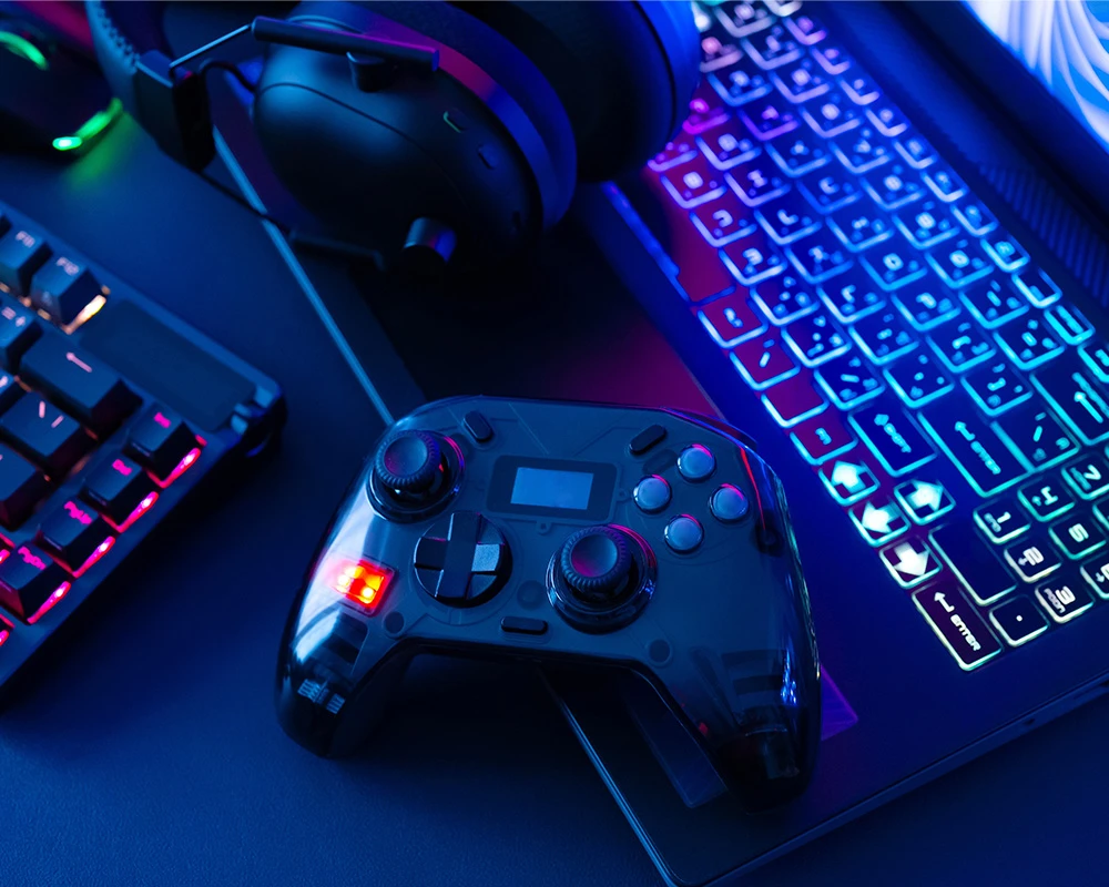 A gaming addiction involving a laptop, controller, and headset.