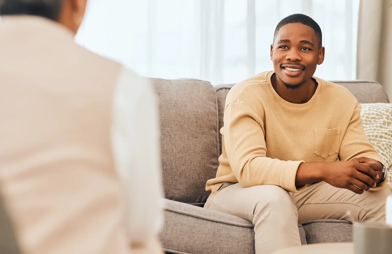 therapy-session-man-smiling-in-camera