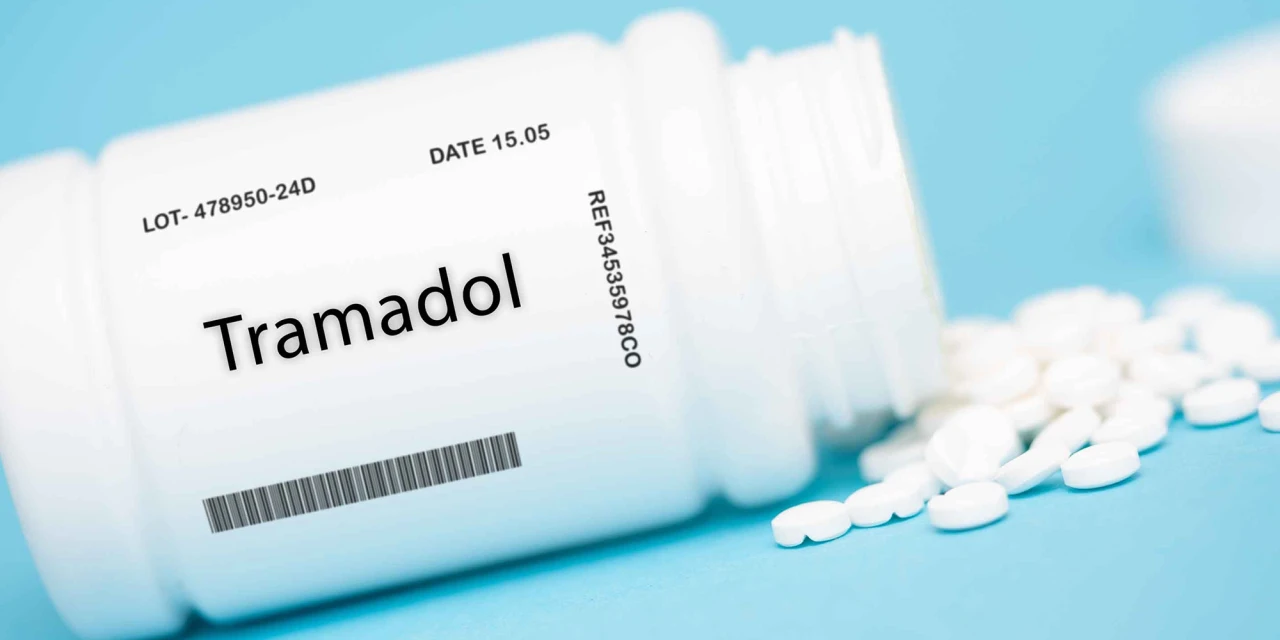 A medication bottle labelled tramadol lies beside white tablets, representing prescription painkiller misuse and the impact of tramadol addiction.