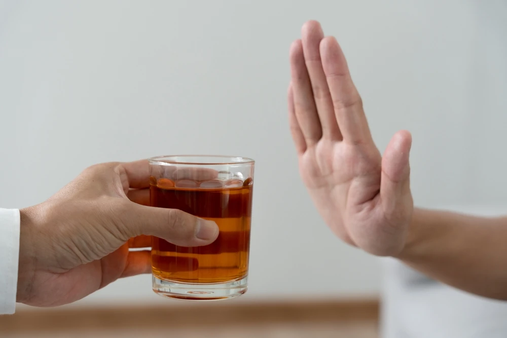 hand-refusing-alcoholic-drink