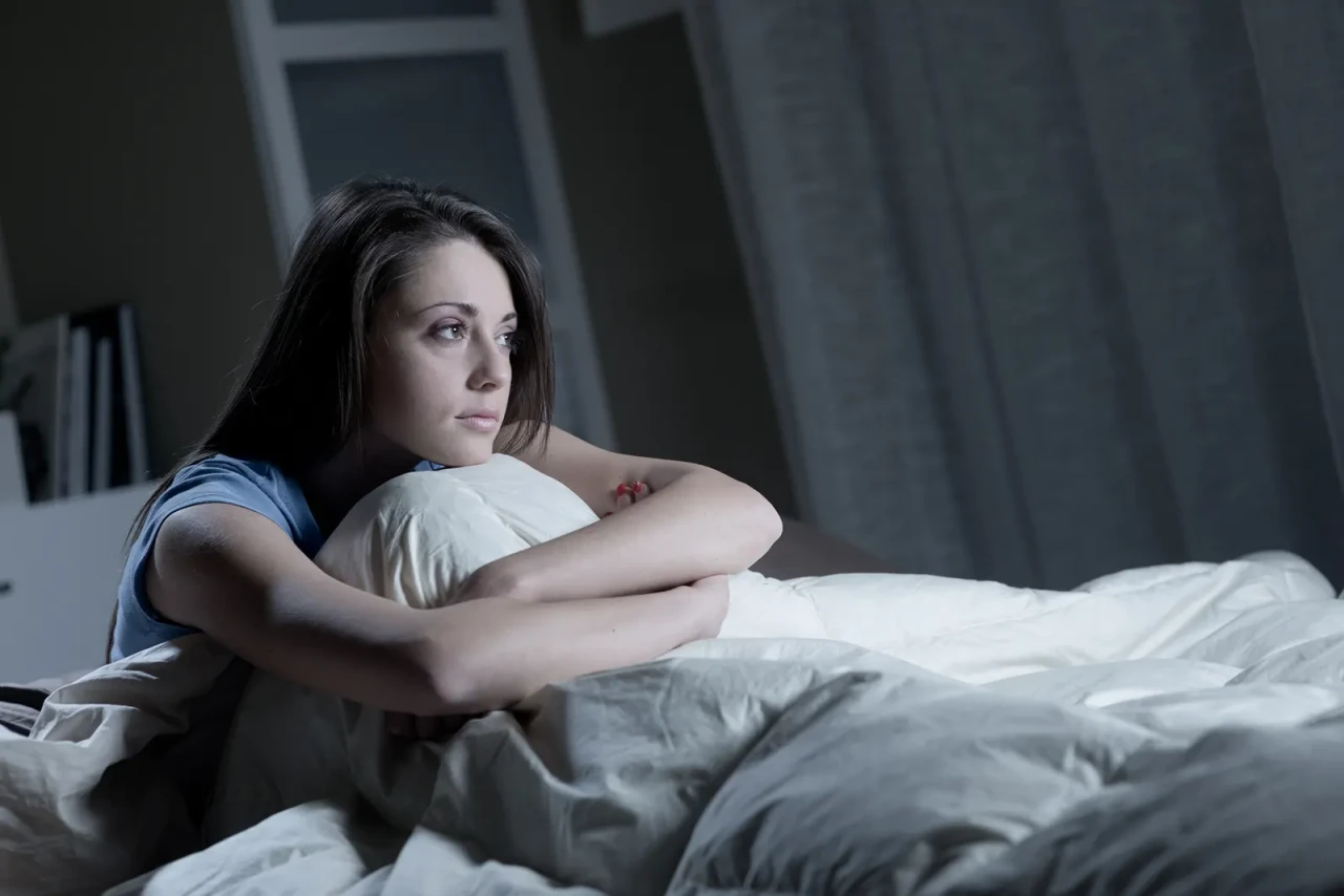 woman-staring-in-bed